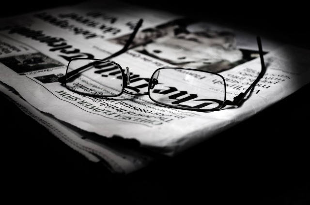 newspapers-and-glasses